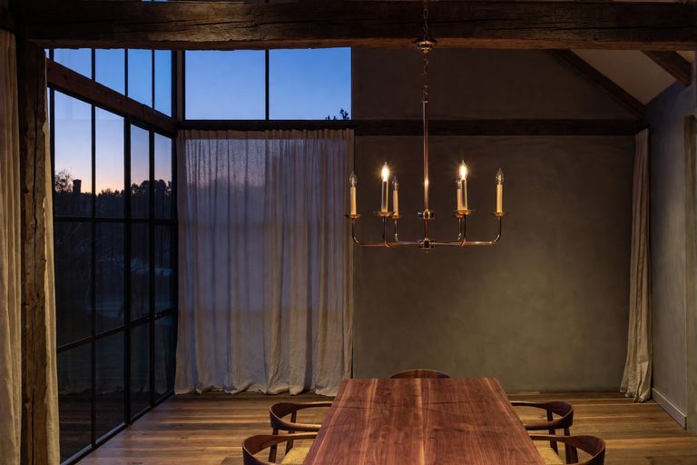 Dining room light hung in a Glencoe home